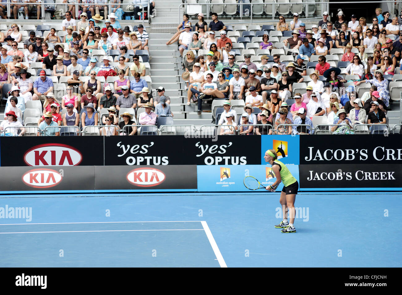 MELBOURNE, AUSTRALIA - JANUARY 21, 2012: WTA tennis player Svetlana Kuznetsova waits for a serve from Sabine Lisicki. Stock Photo
