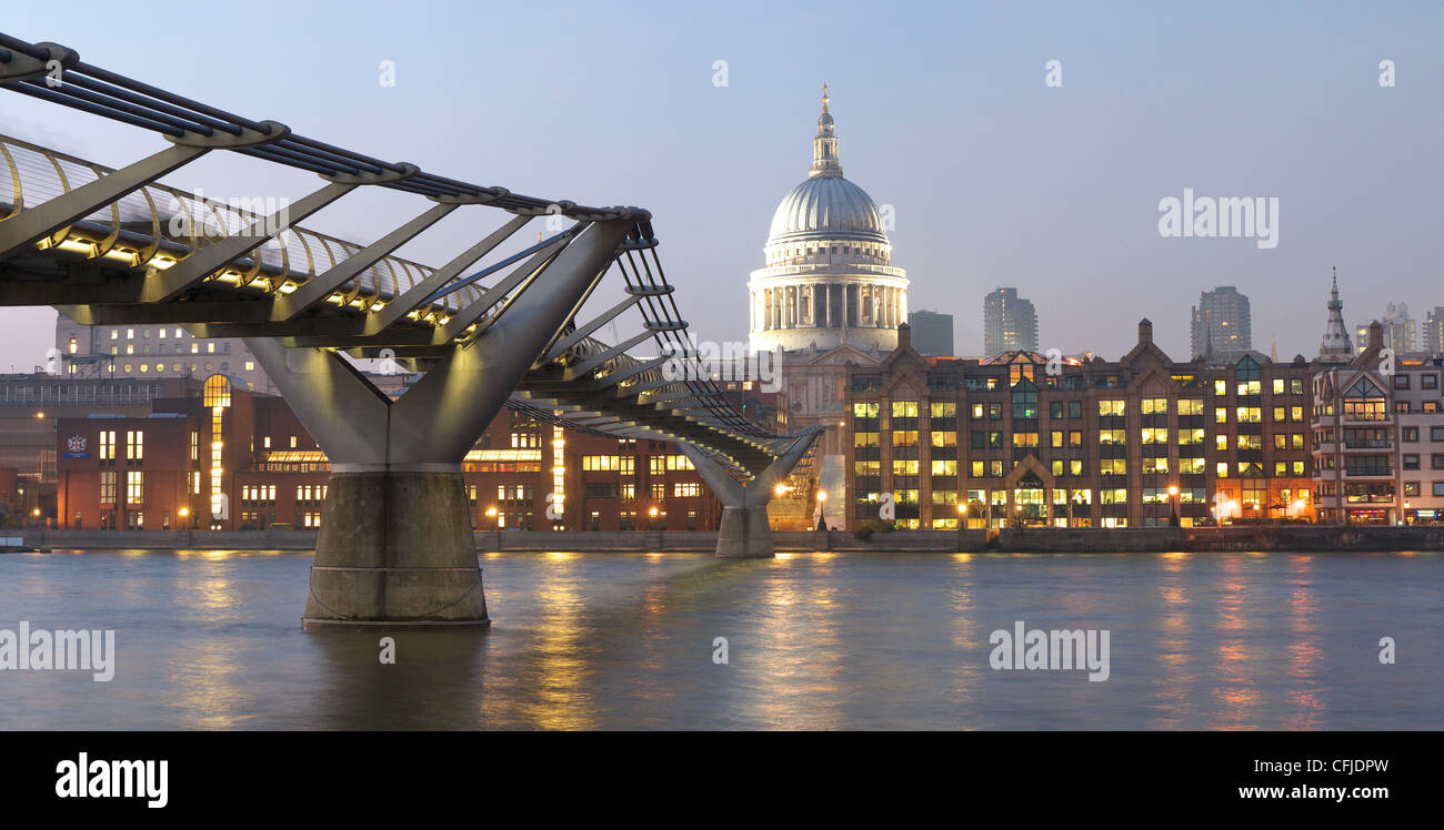 View of the Millennium Bridge over the River Thames in London with St Paul's Cathedral in the background Stock Photo