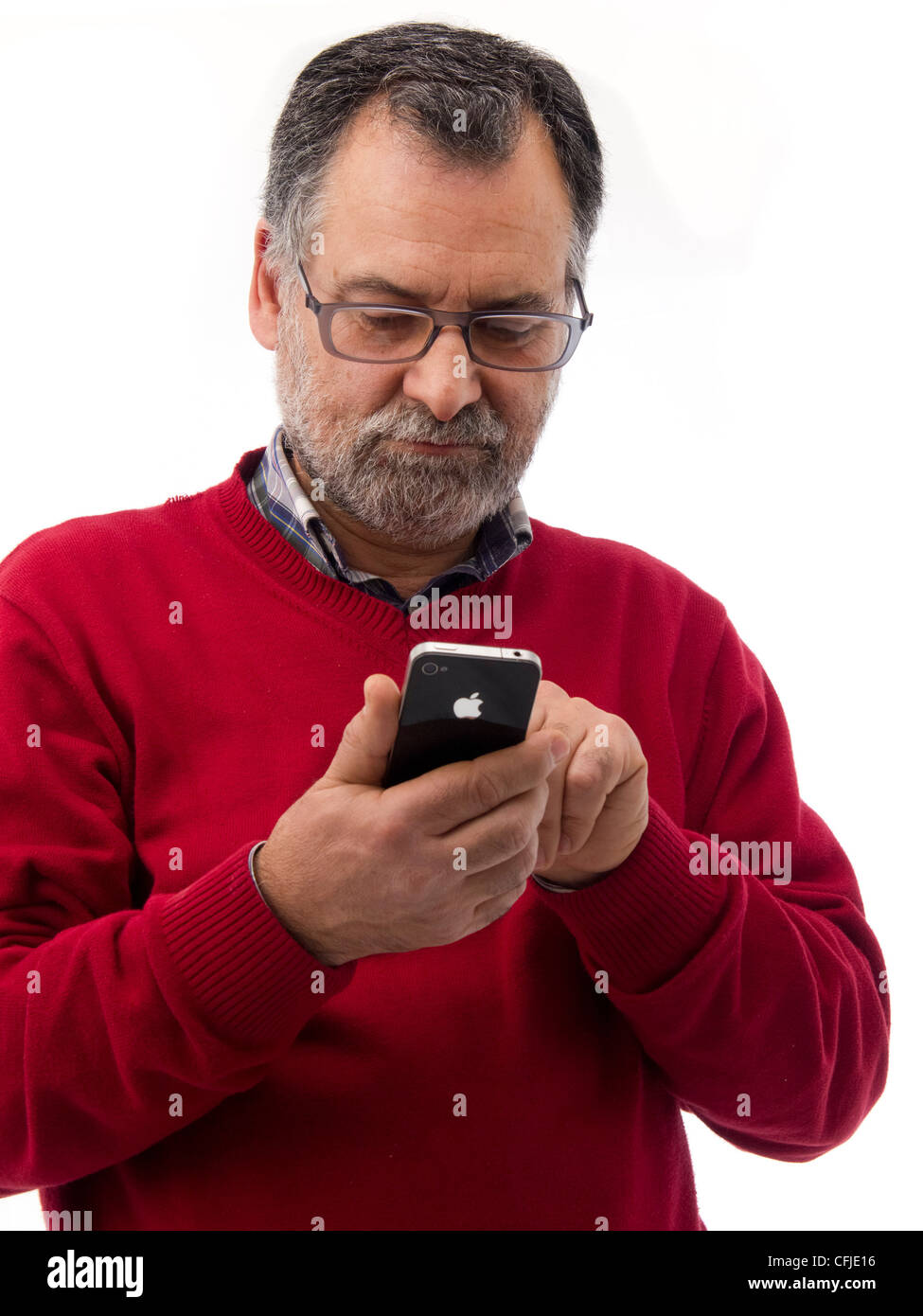 Middle-aged man using iPhone isolated on white background Stock Photo