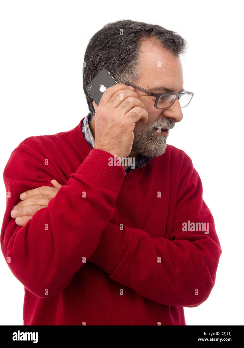 Middle-aged man talking on iPhone isolated on white background Stock Photo