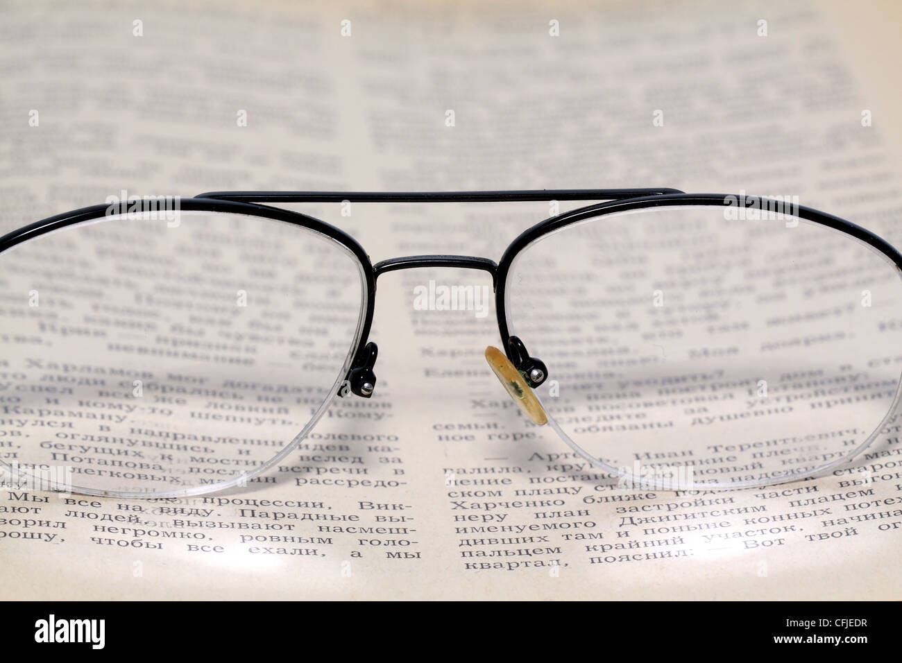 spectacles on old book Stock Photo