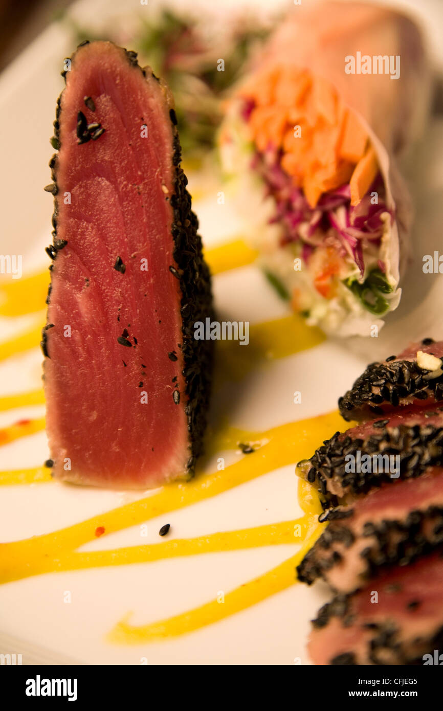 Seared ahi tuna encrusted with toasted sesame seeds Stock Photo Alamy