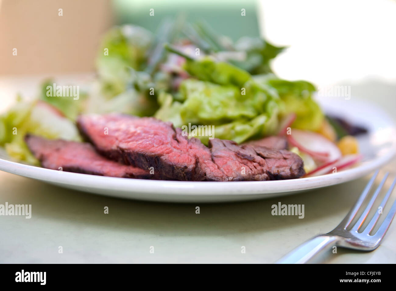 Sliced strip steak salad Stock Photo Alamy