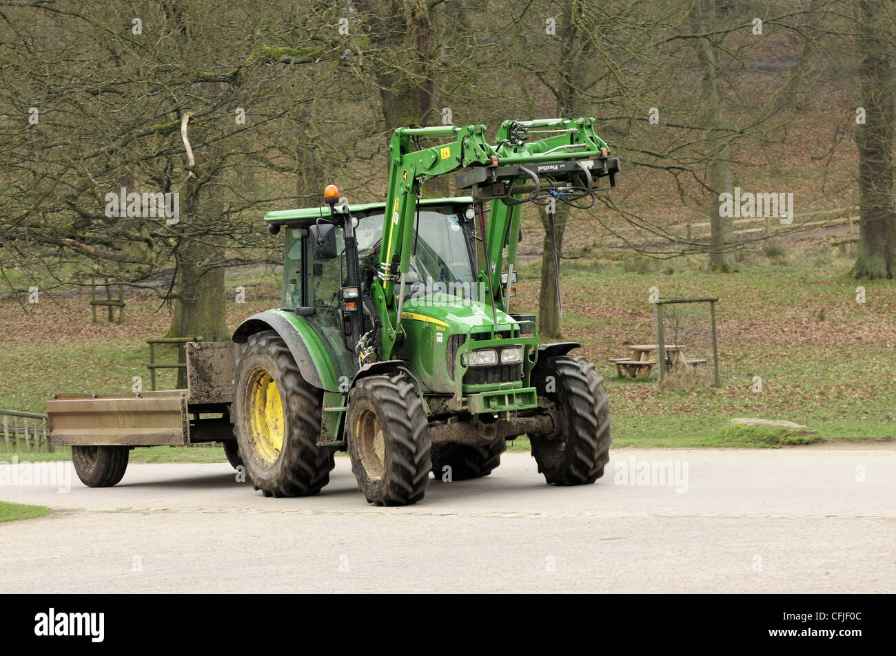 Green 'John Deere' tractor in Lyme Park, near Stockport Stock Photo