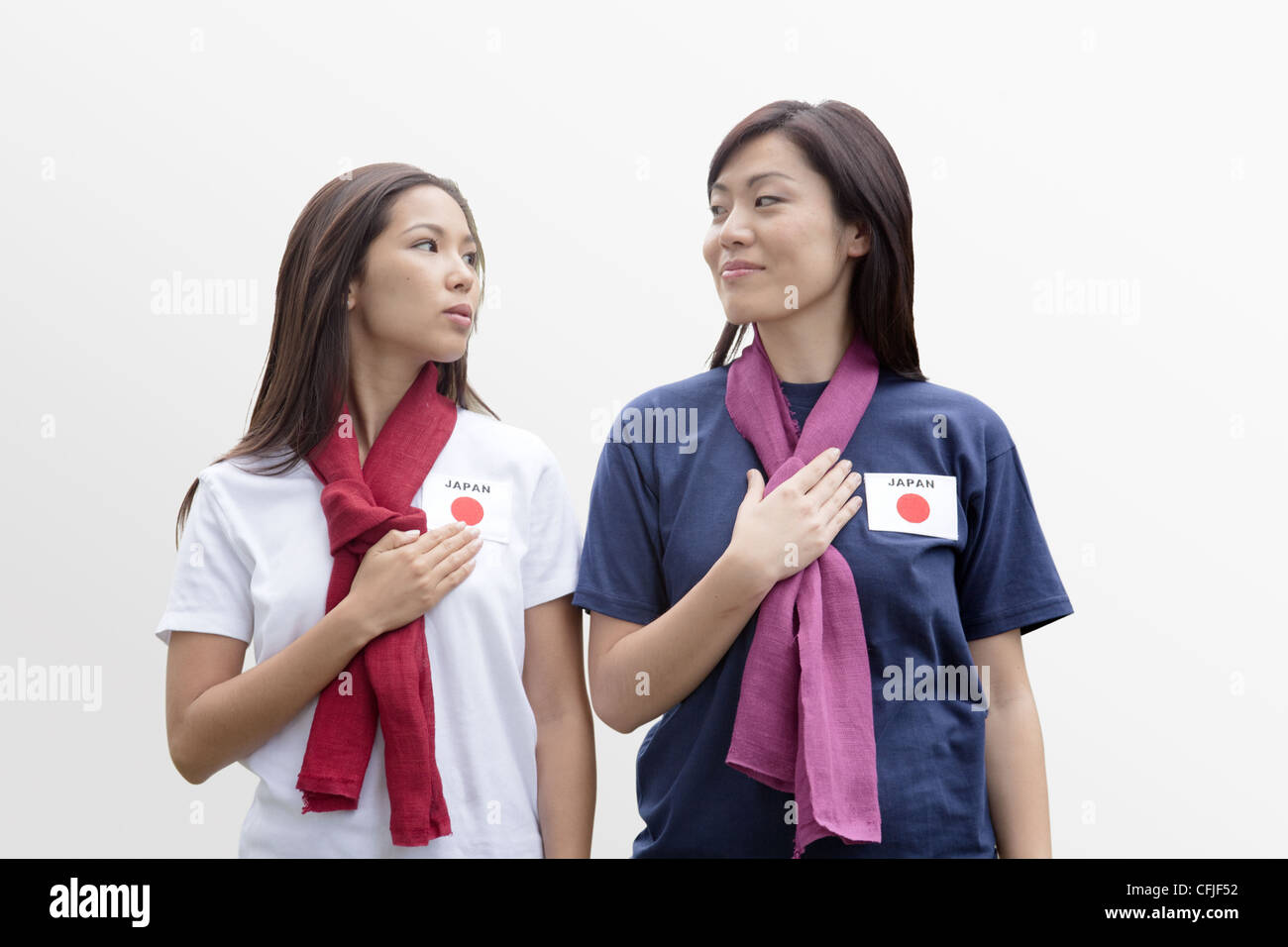 Young women supporting the Japan women's national football team Stock Photo