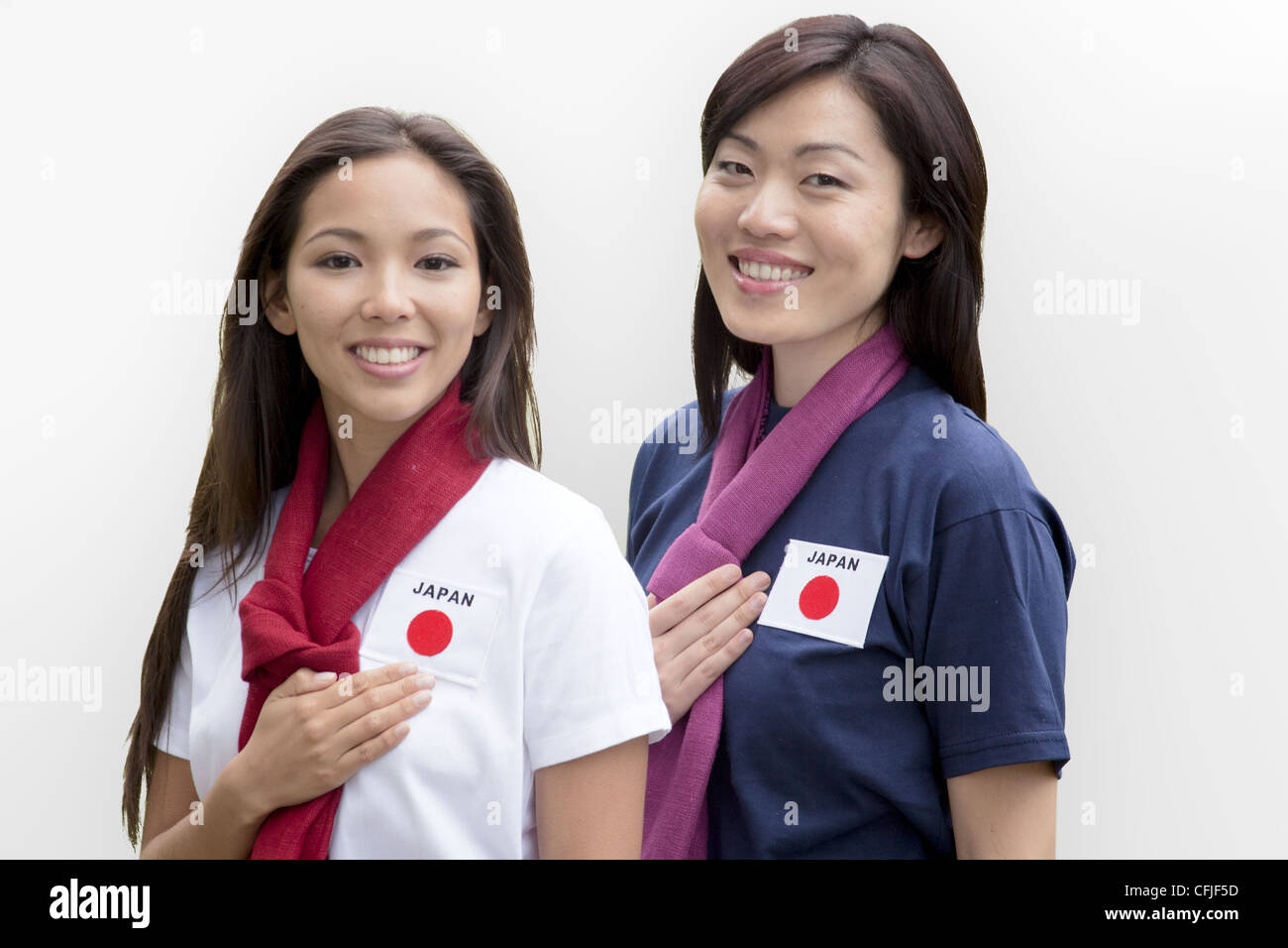 Young women supporting the Japan women's national football team Stock Photo