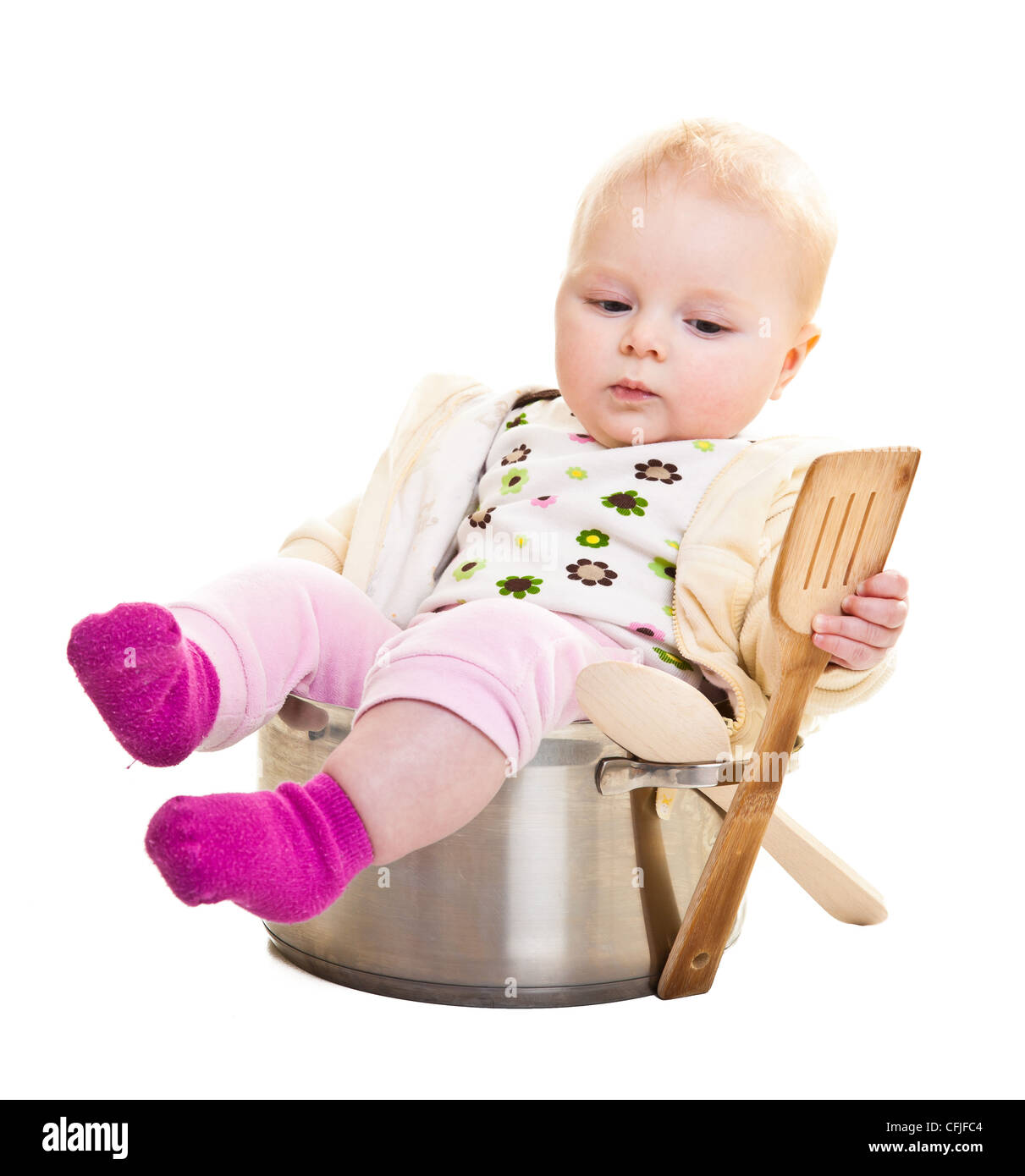 Infant in cooking pan isolated on white Stock Photo - Alamy