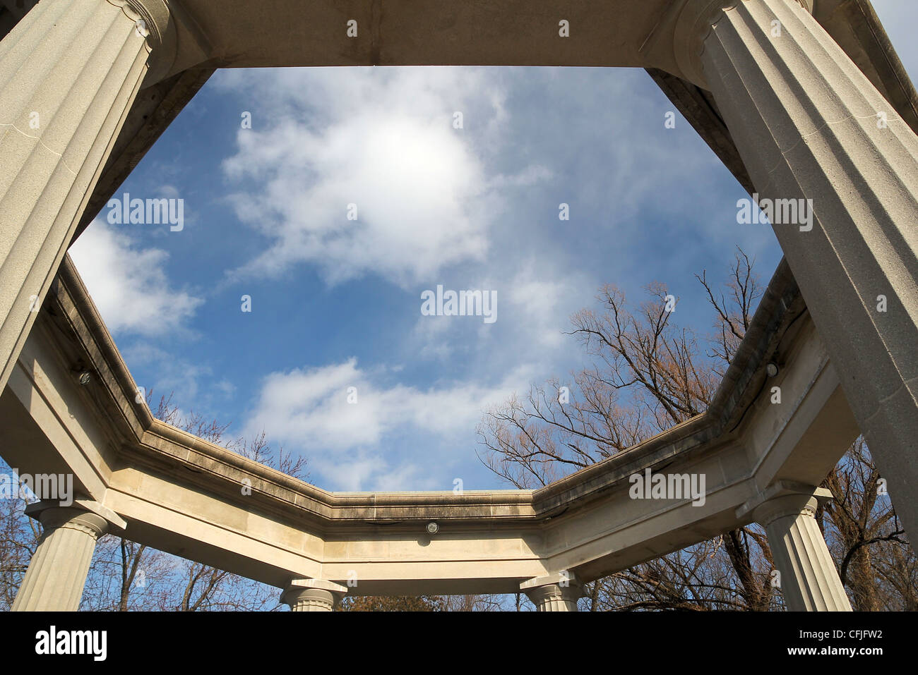 Looking at the sky through Saratoga Springs' War Memorial, built in 1932 to honor veterans of World War I, in Congress Park. Stock Photo