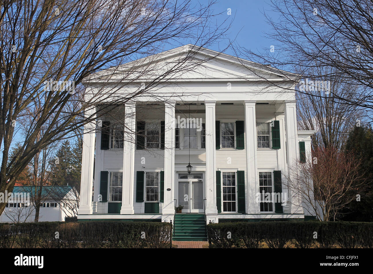 This Greek Revival style home, built in 1832, is one of Saratoga Springs' many Victorian era homes. Stock Photo