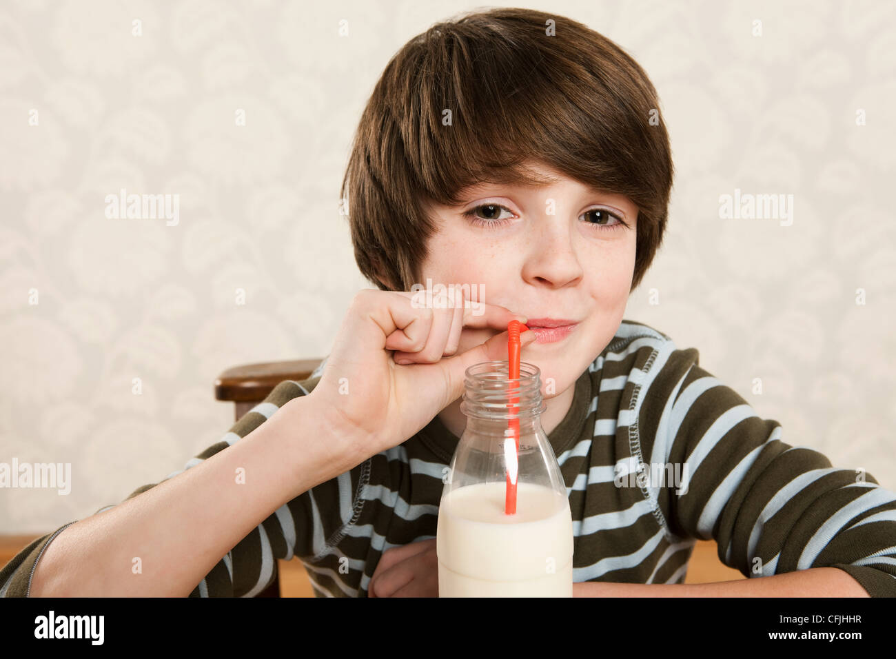 Boy drinking milk Stock Photo