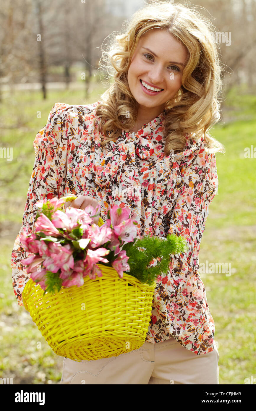 lovely woman with lily flower Stock Photo - Alamy