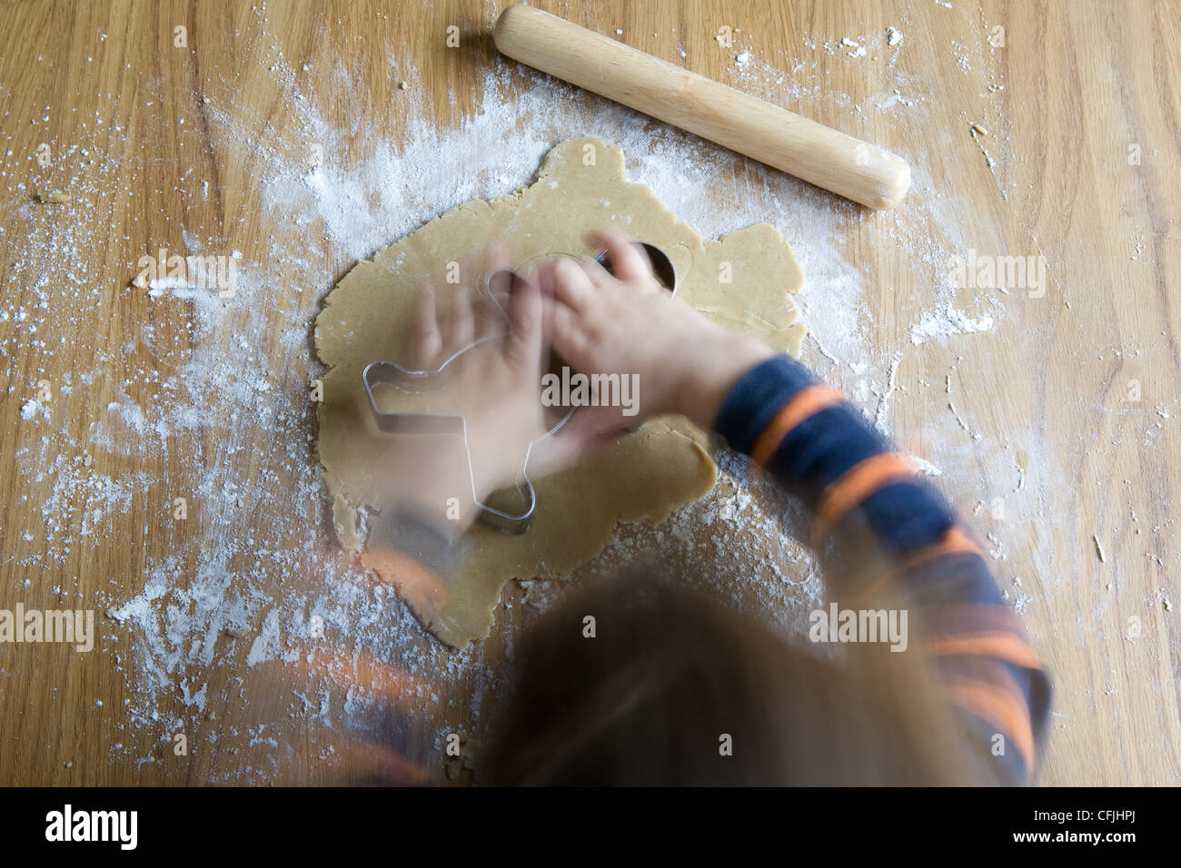 Little boy making gingerbread men Stock Photo Alamy