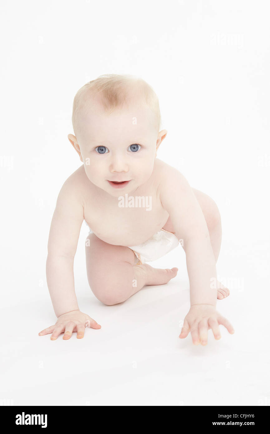 Baby boy crawling Stock Photo
