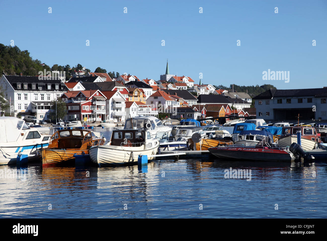 Local boats crammed into harbour at Kragero, South Norway, Scandinavia, Europe Stock Photo