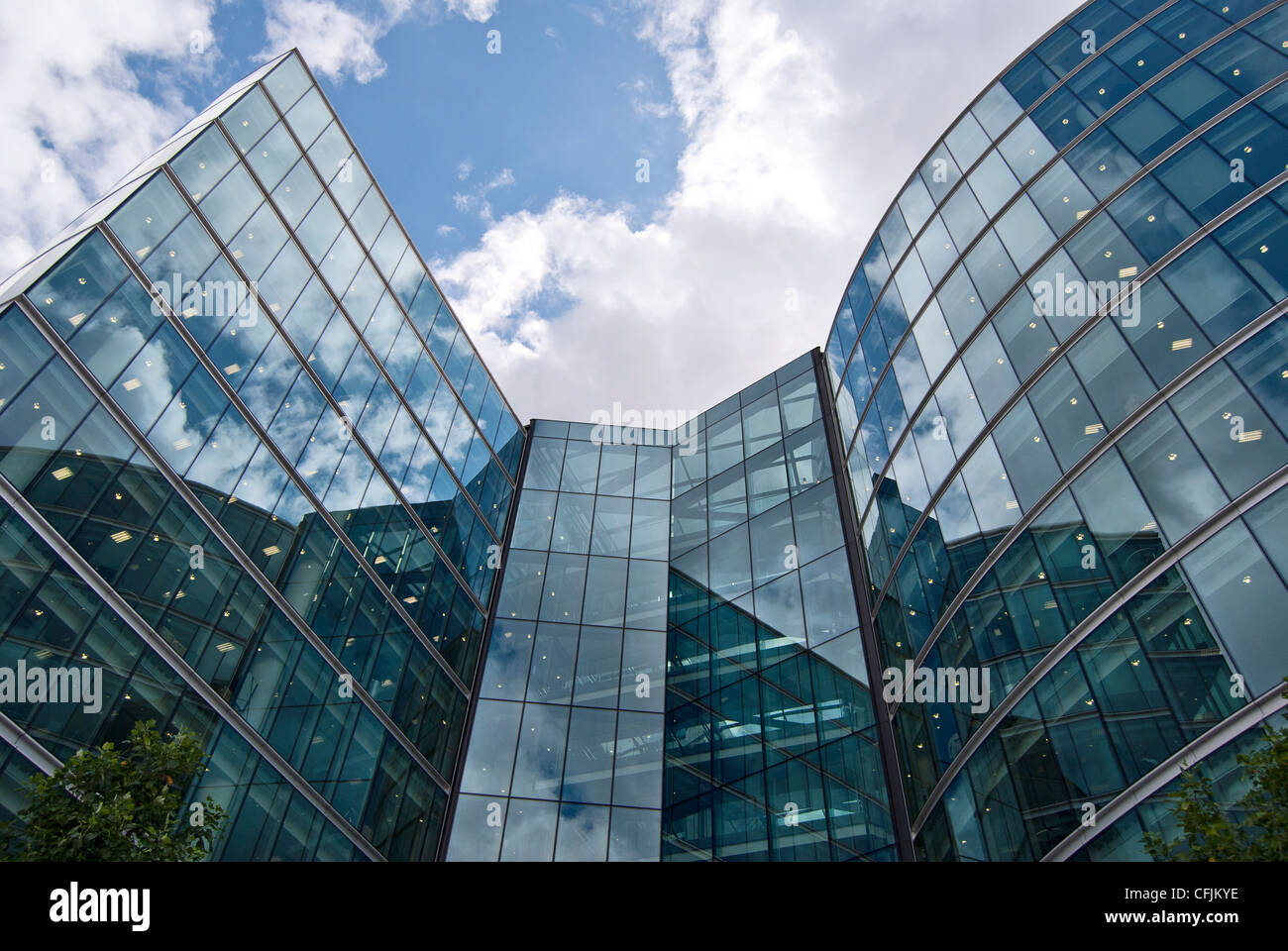Part of facade of skyscrapper in London, UK, cloudy day time, full color. Stock Photo