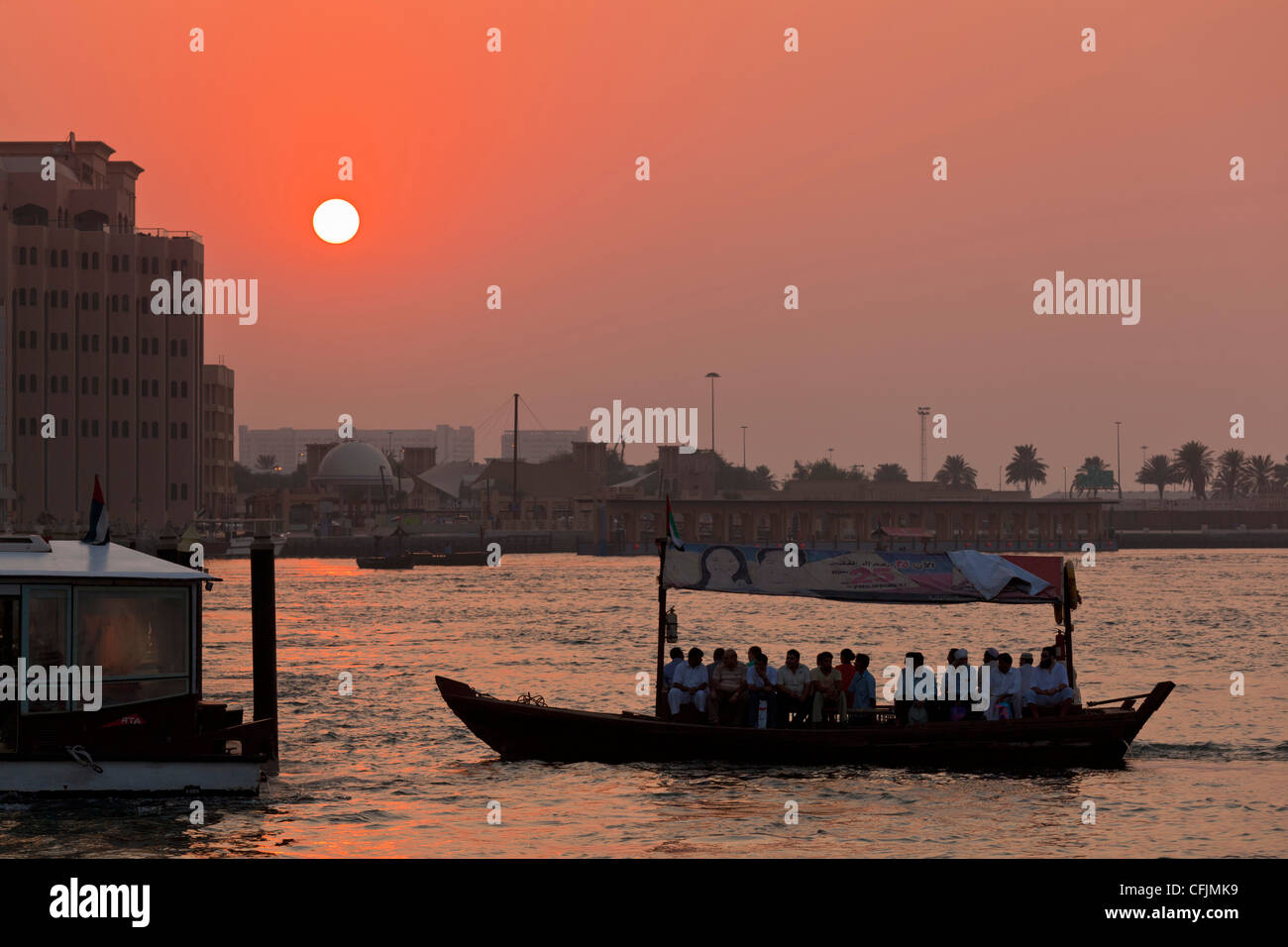 Abra Water taxi, Dubai Creek at sunset, Bur Dubai, Dubai, United Arab Emirates, Middle East Stock Photo