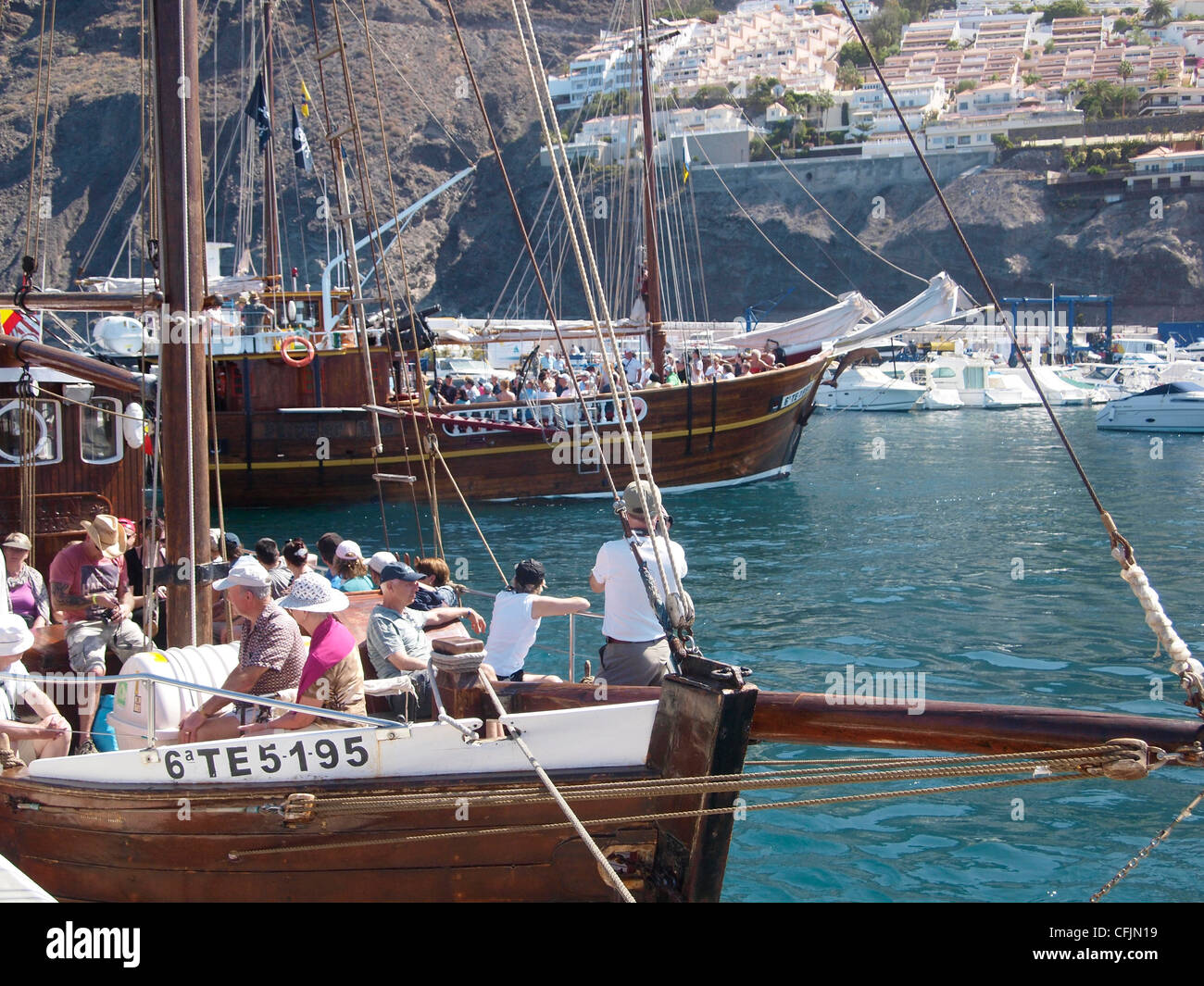 TOURIST TRIPS LEAVING MARINA AND HARBOUR AT LOS GIGANTES TENERIFE SPAIN Stock Photo