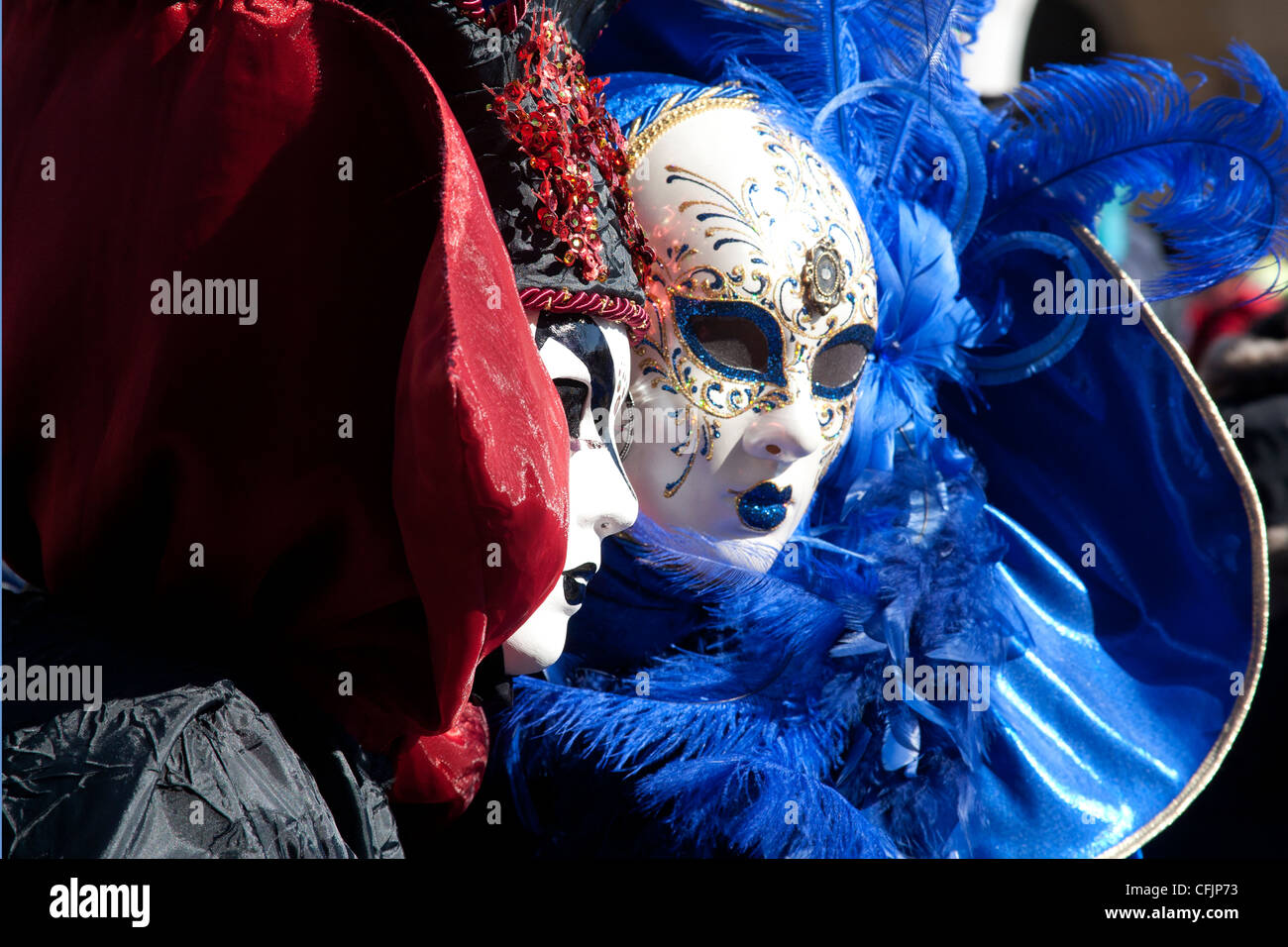 People dressed up in blue and red carnival costume for the Carnival of ...