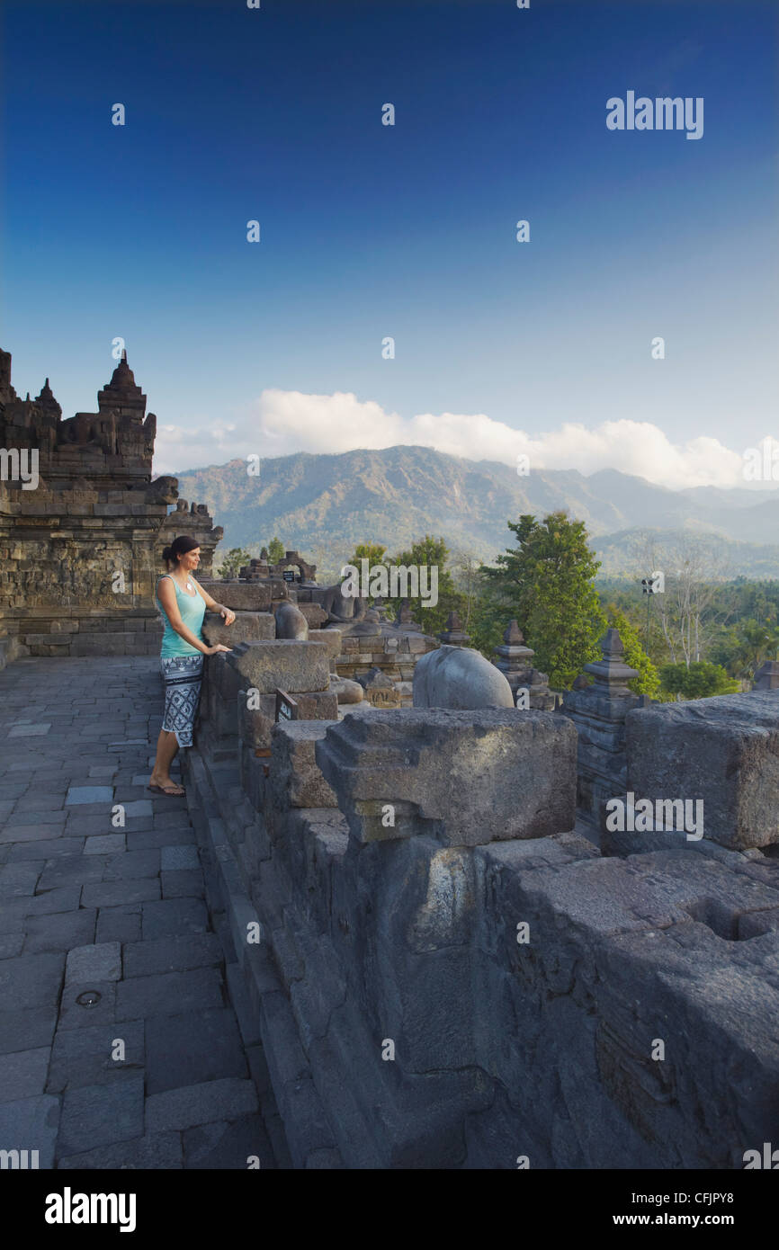 Woman at Borobudur, UNESCO World Heritage Site, Java, Indonesia ...