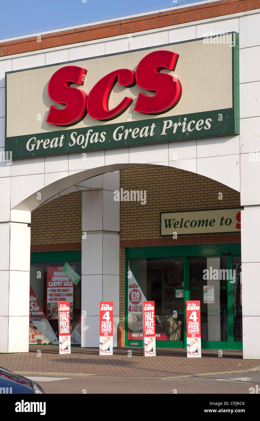 Sofa Warehouse entrance with sale signs Stock Photo
