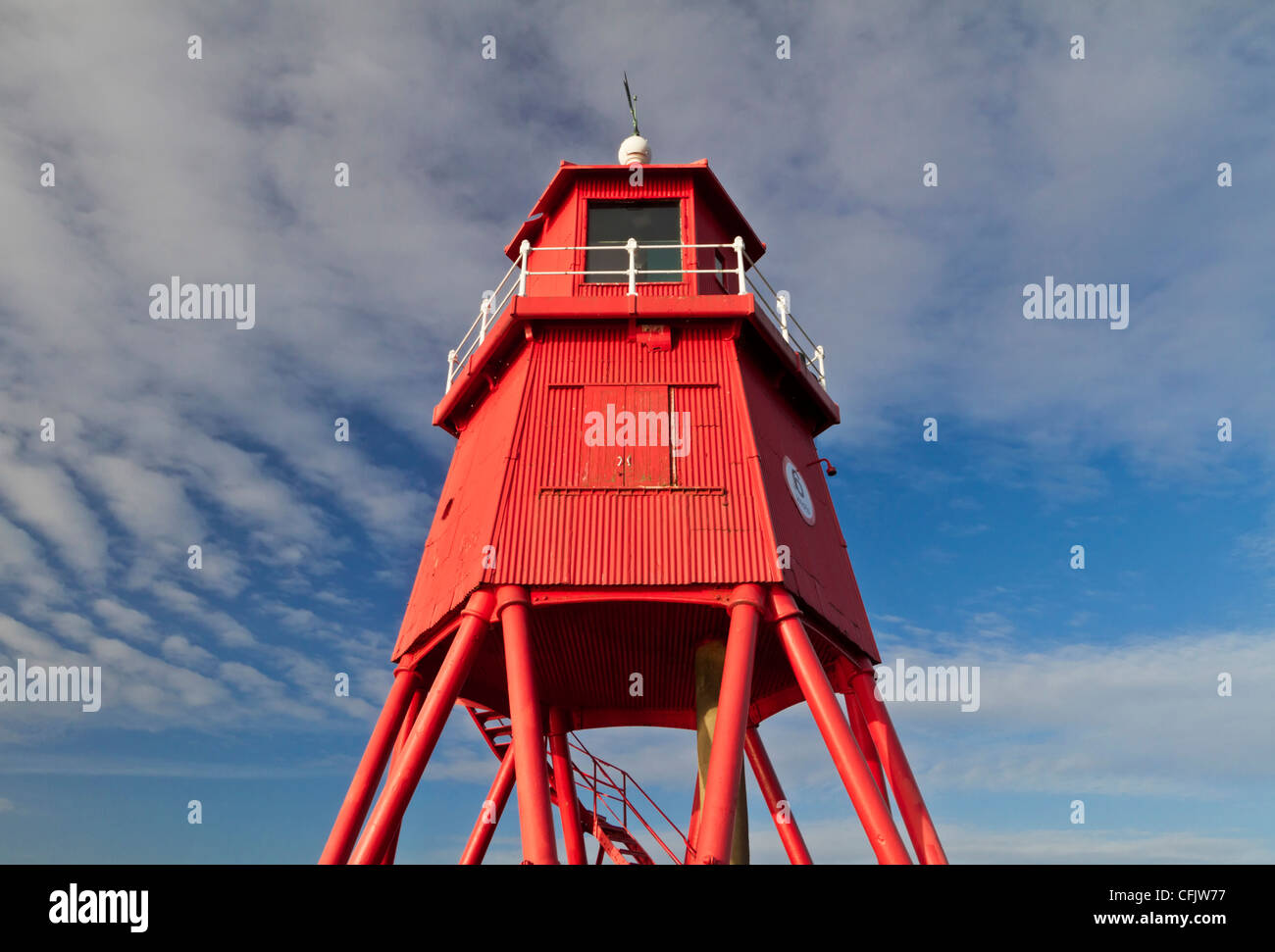 The Herd Groyne Lighthouse near the entrance to the River Tyne at Littlehaven, South Shields, South Tyneside, England Stock Photo