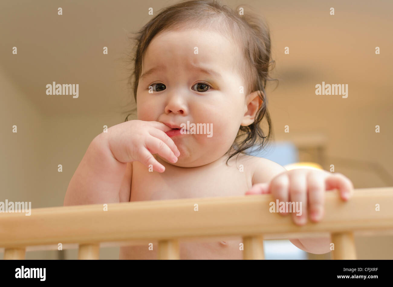 Cute Baby Girl In A Crib Mixed Ethnicity Asian Caucasian Stock