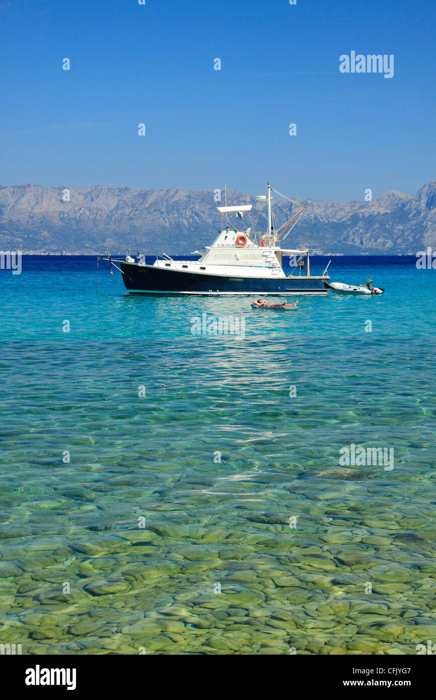Motorboat moored in Divna bay, Peljesac peninsula, Croatia Stock Photo