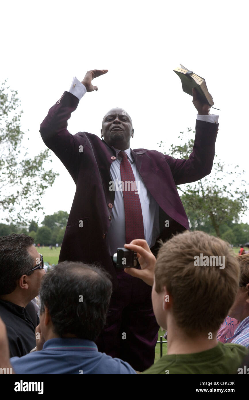 Enthusiastic evangelical preacher, waving his arms around and preaching in Speakers' Corner, Hyde Park, London Stock Photo