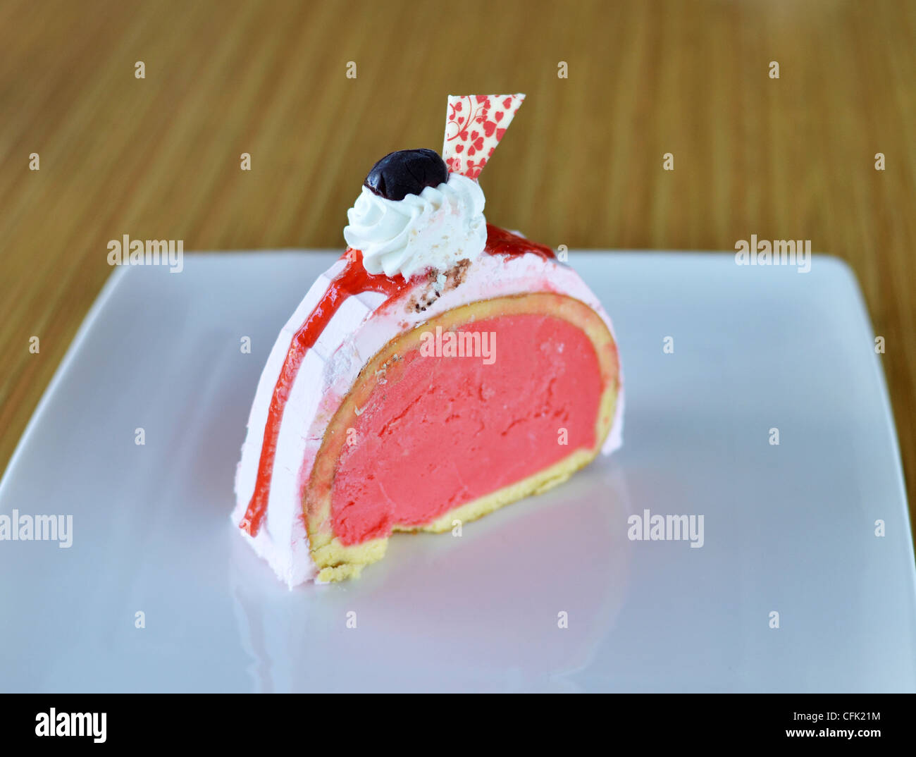 strawberry ice cream cake with whipped cream Stock Photo
