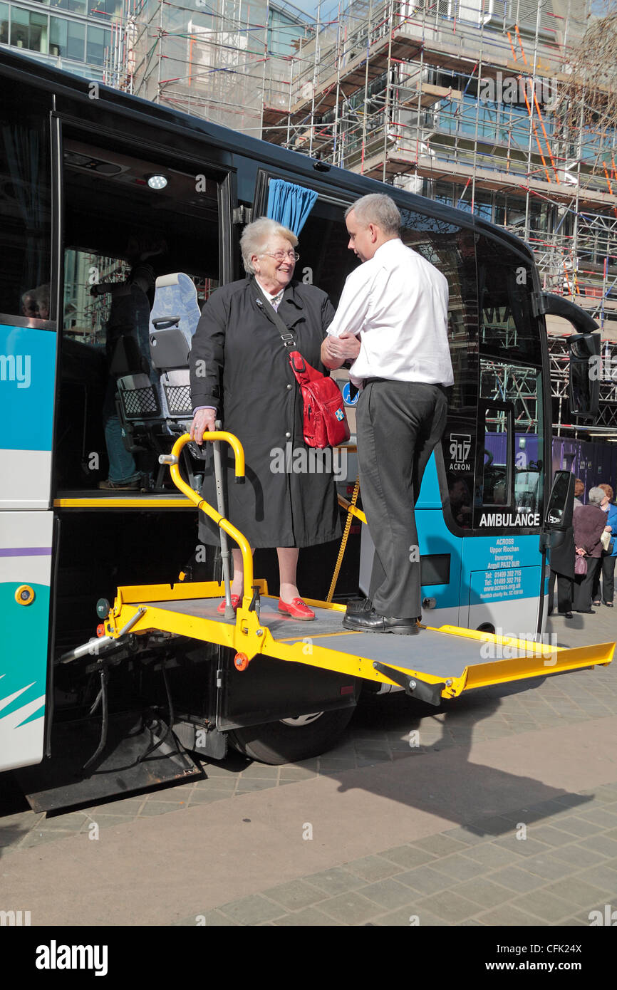 Wheelchair (or stretcher) lift on an ACROSS Jumbulance, a specially converted bus used to transport disabled people to Lourdes. Stock Photo