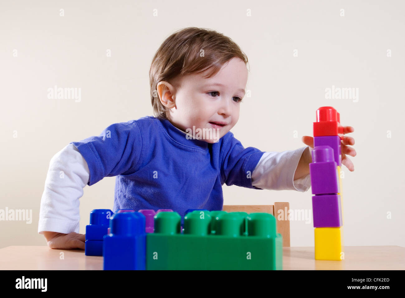 Boy Playing with Blocks Stock Photo - Alamy