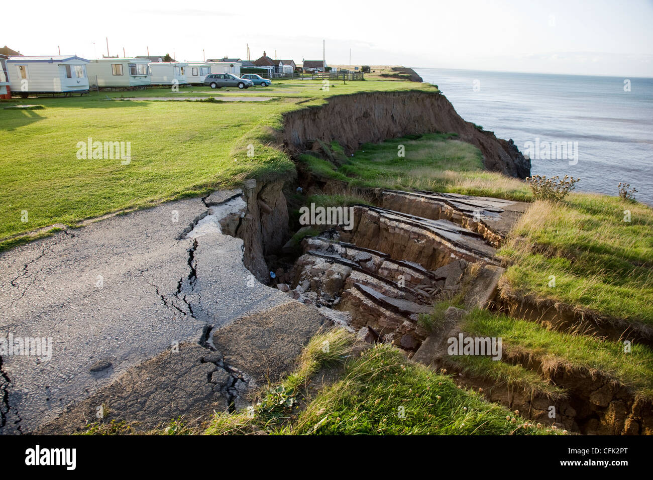 Road collapsing due to cliff erosion in Aldbrough, North Yorkshire Stock Photo