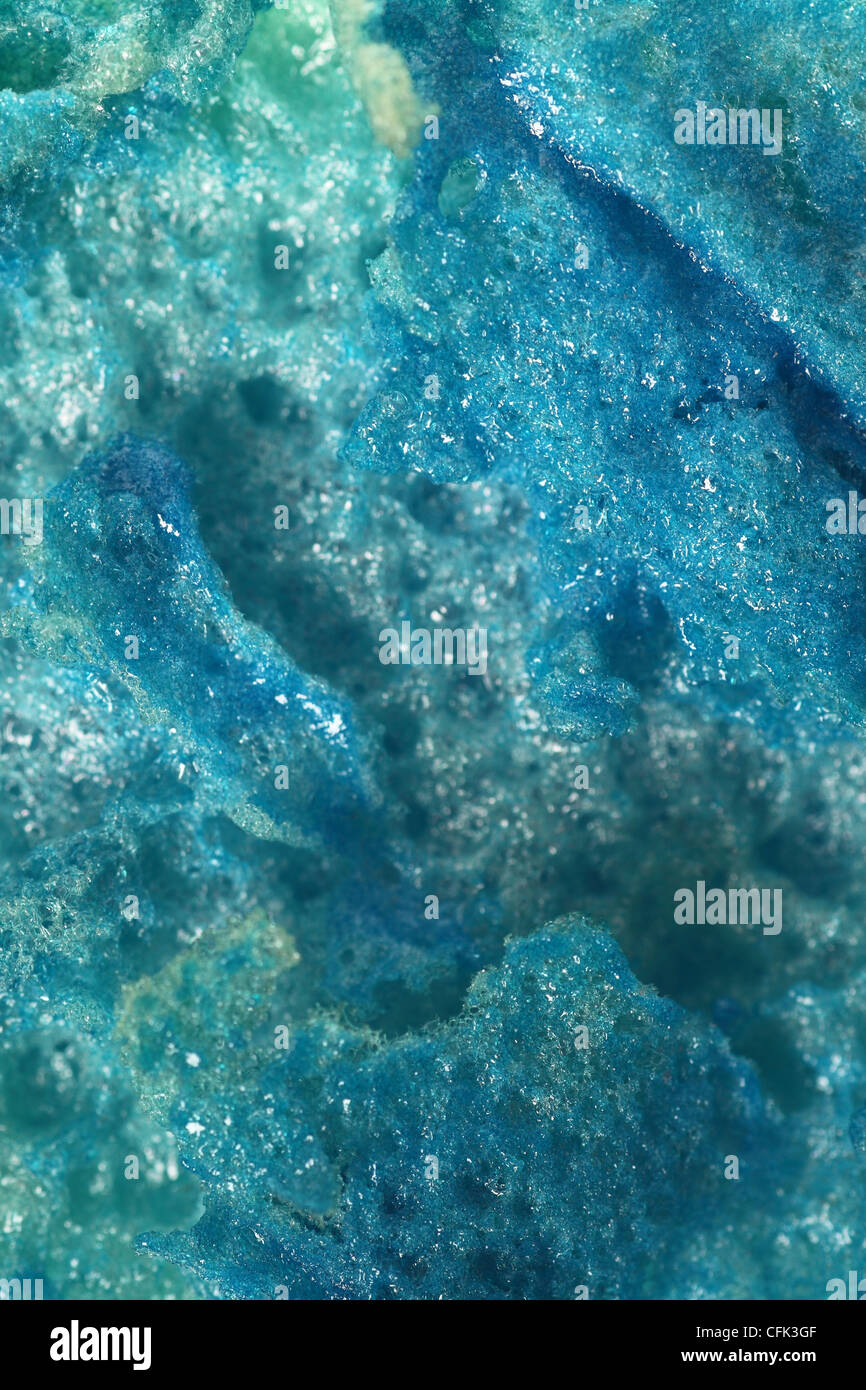 Green abrasive sponge texture background blue Stock Photo Alamy