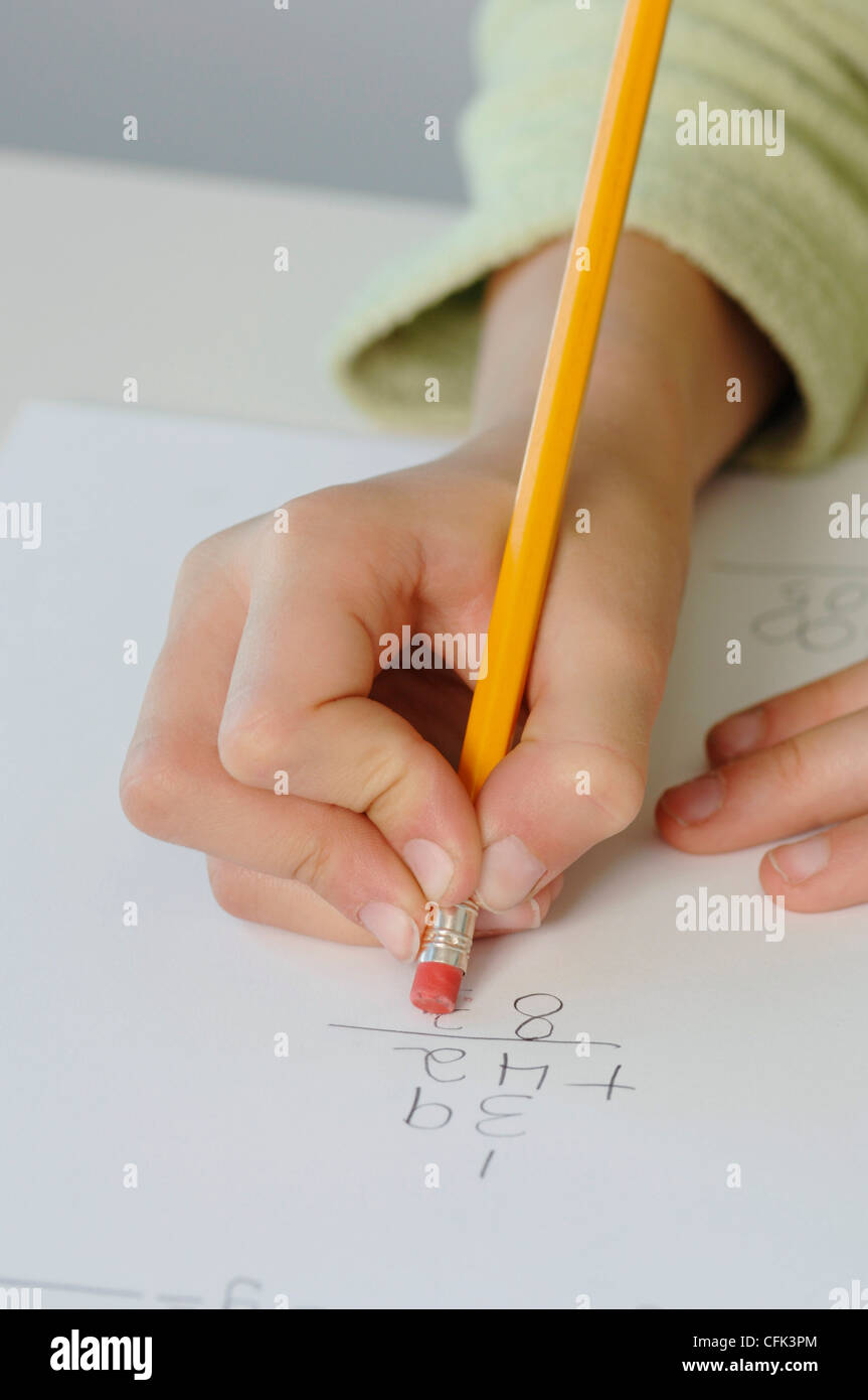 Child using Pencil Eraser Stock Photo Alamy