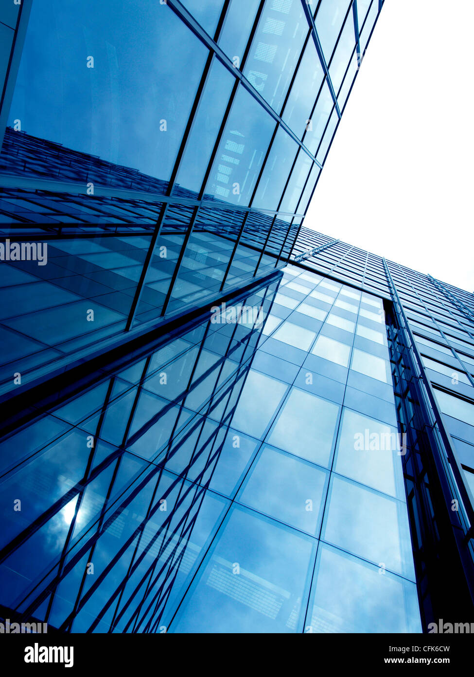Business building in blue with reflections Stock Photo