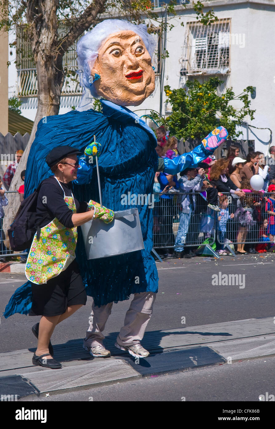 Giant puppet pass through the street during the Adloyada event in Holon Israel Stock Photo