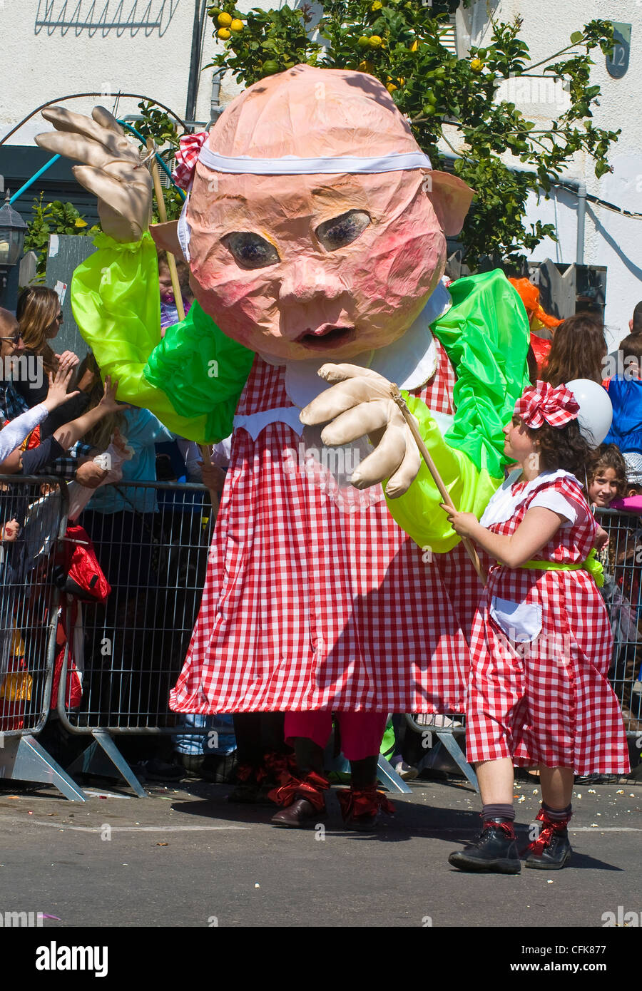 Giant puppet pass through the street during the Adloyada event in Holon Israel Stock Photo
