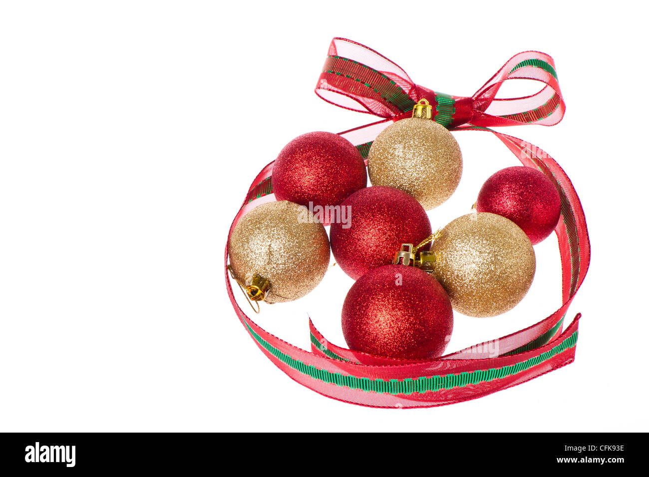 christmas balls with big ribbon around isolated on white background ...