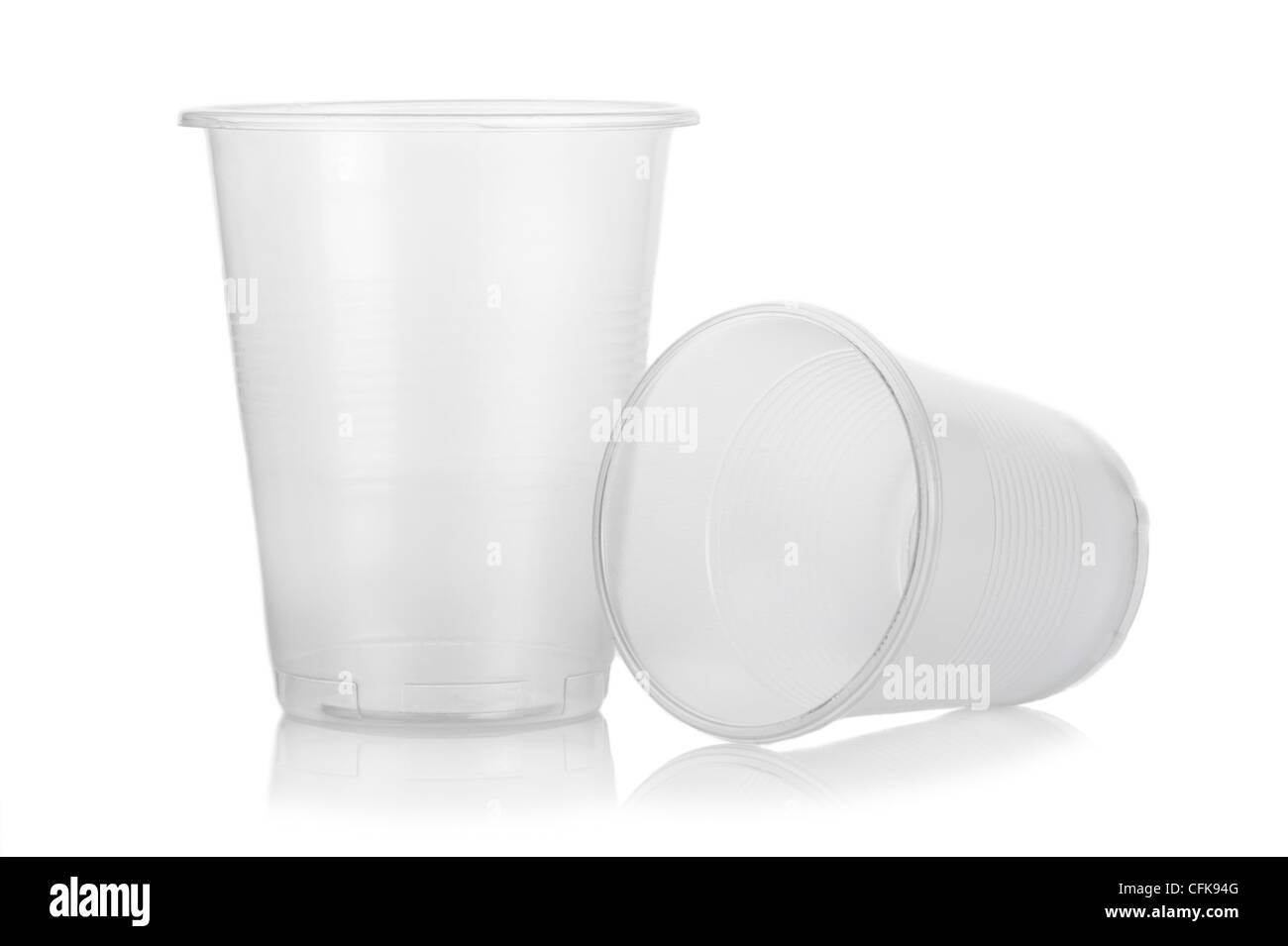 Two empty disposable plastic glass isolated on white background Stock