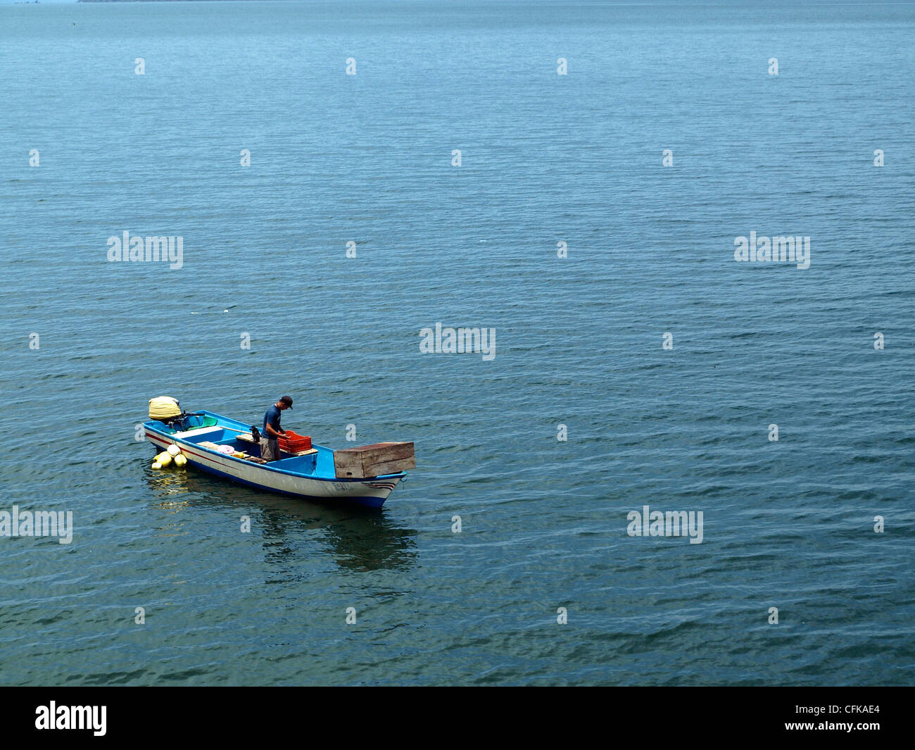 Fisherman and his boat hi-res stock photography and images - Alamy
