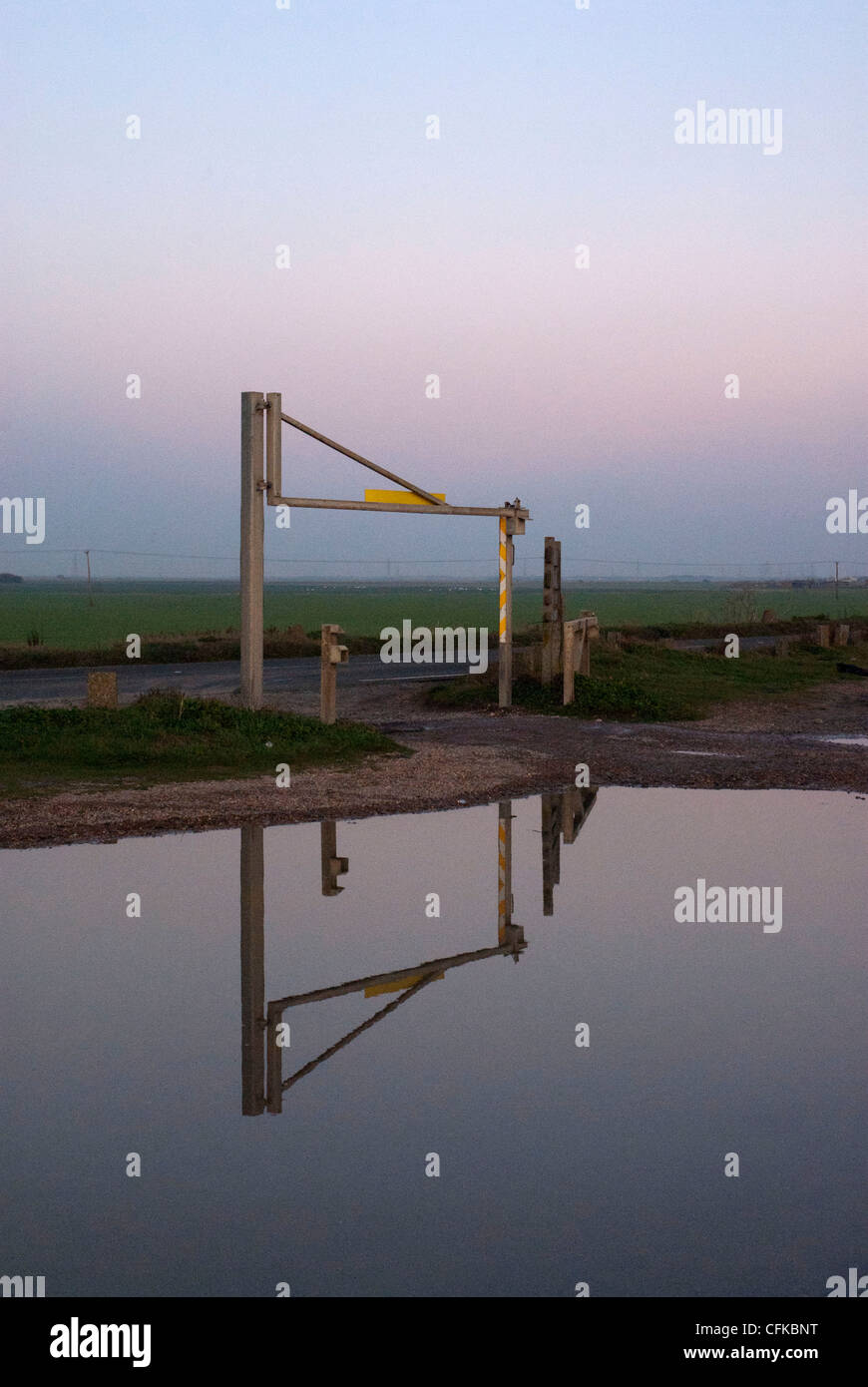 Reflection Of Car Park Entrance In Large Puddle Hi res Stock 