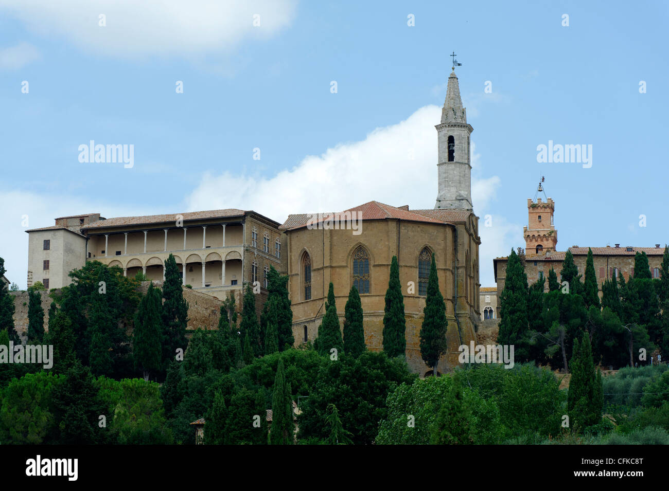 Pienza. Tuscany. Italy. View of the rear of the Duomo and its bell tower beside it is the Palazzo Piccolomini with its multi Stock Photo