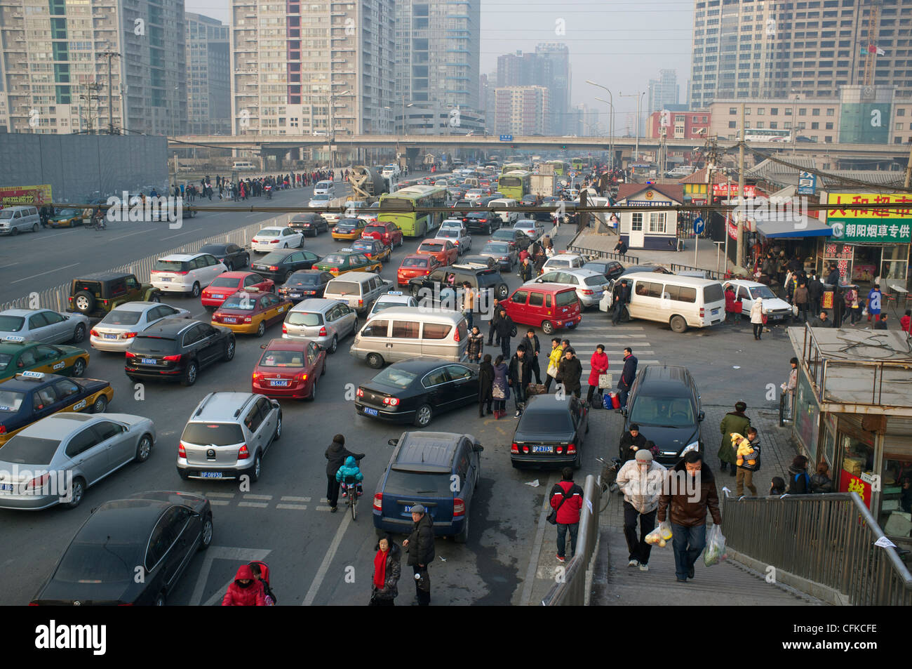 General scene with cars and apartment buildings in Beijing, China. 07-Jan-2012 Stock Photo