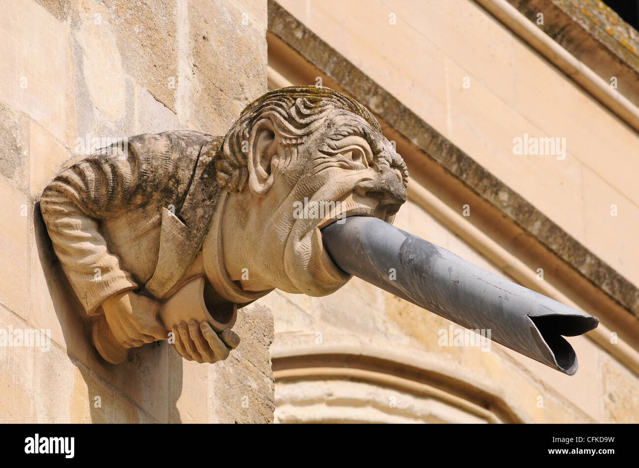 Modern gargoyle representing a former dean. Chichester Cathedral. Stock Photo