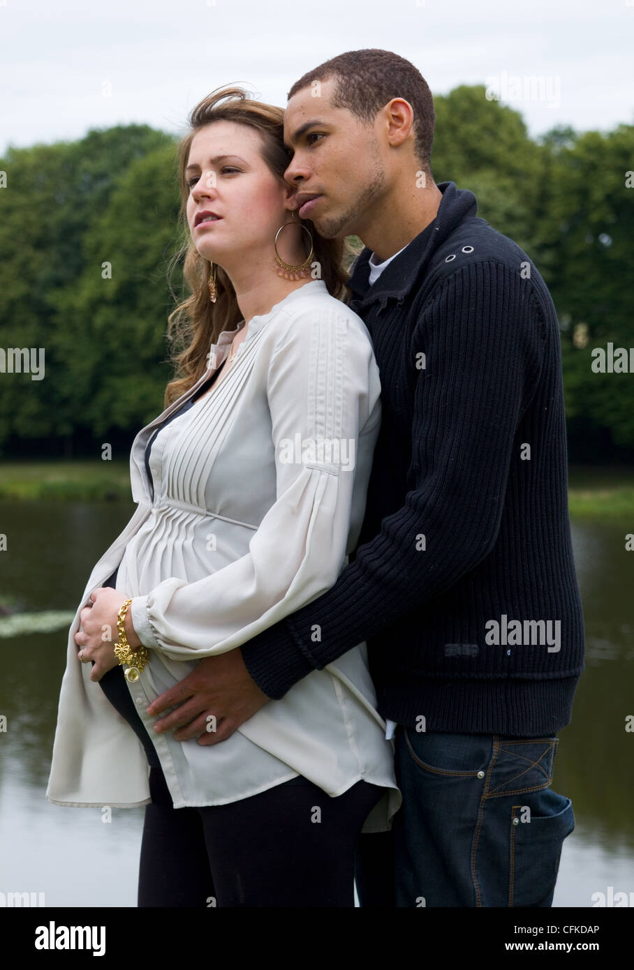Young pregnant couple black and white, third trimester pregnancy Stock Photo pic