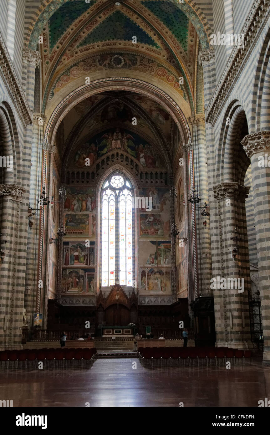 Orvieto. Umbria. Italy. View of the Presbytery and Apse from the Cathedrals elegant interior which consists of central nave and Stock Photo