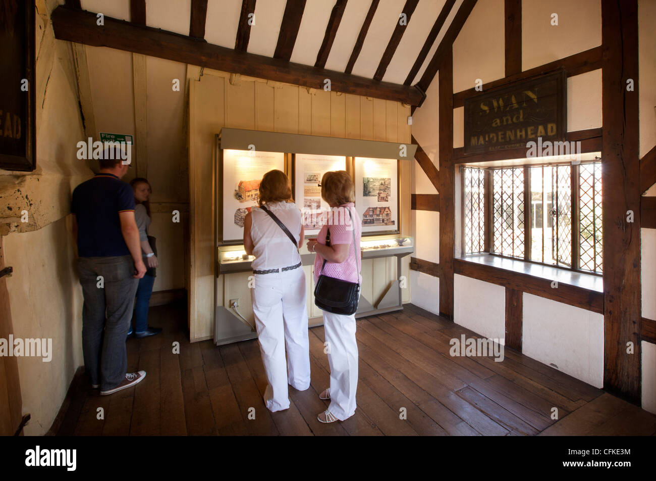 Warwickshire, Stratford on Avon, Shakespeare’s birthplace, visitors looking at history of house exhibition Stock Photo