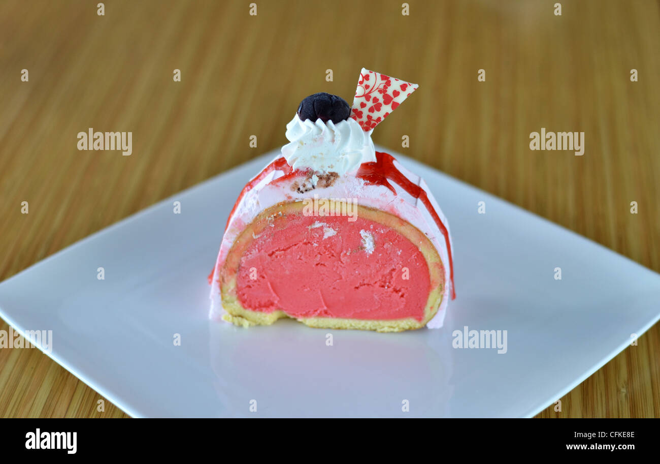 strawberry ice cream cake with whipped cream Stock Photo