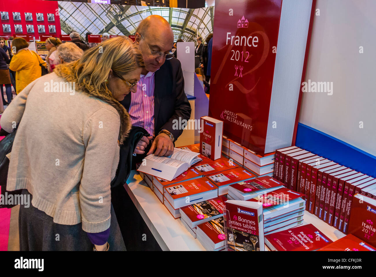 Paris, France, People Visiting Salon du Livre, Book Fair, Red Michelin Restaurant Guides, publishing business Stock Photo