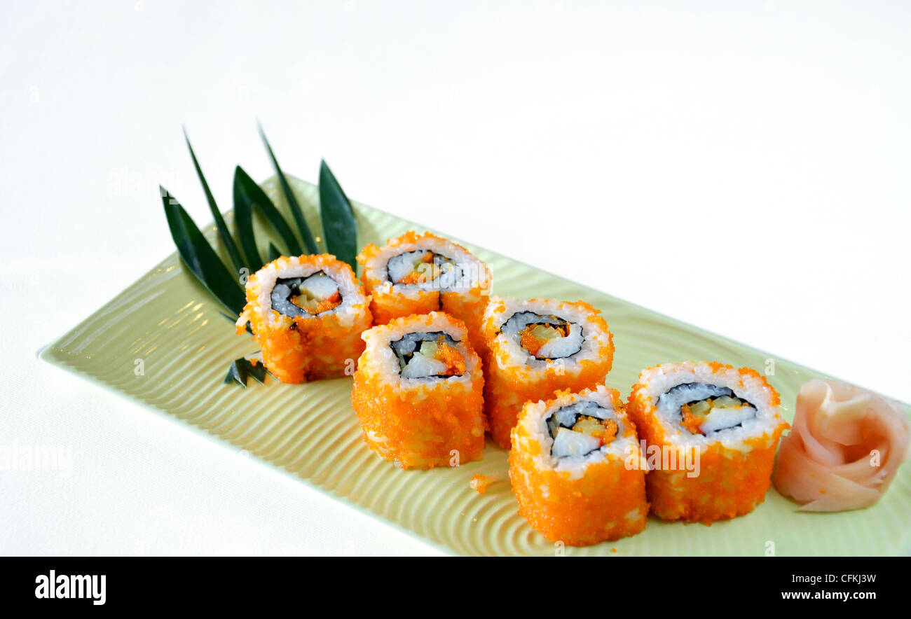 egg imitation crabmeat cucumber tuna and salmon roll sushi Stock Photo